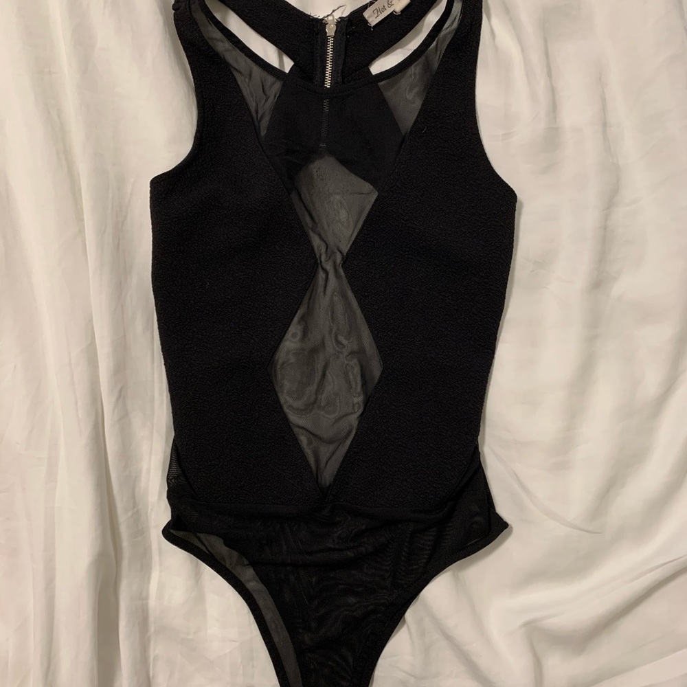 Black bodysuit with sheer parts and open back